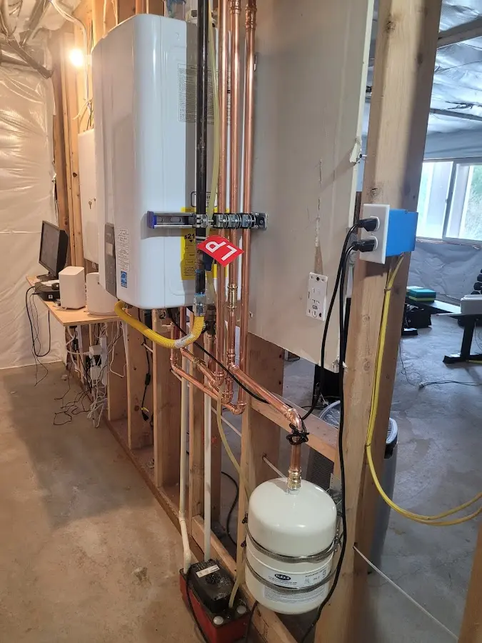 Licensed plumber repairing a kitchen sink in Marple